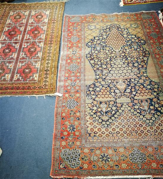 A Tekke Bokhara rug and a similar smaller rug 200 x 128cm and 165 x 95cm